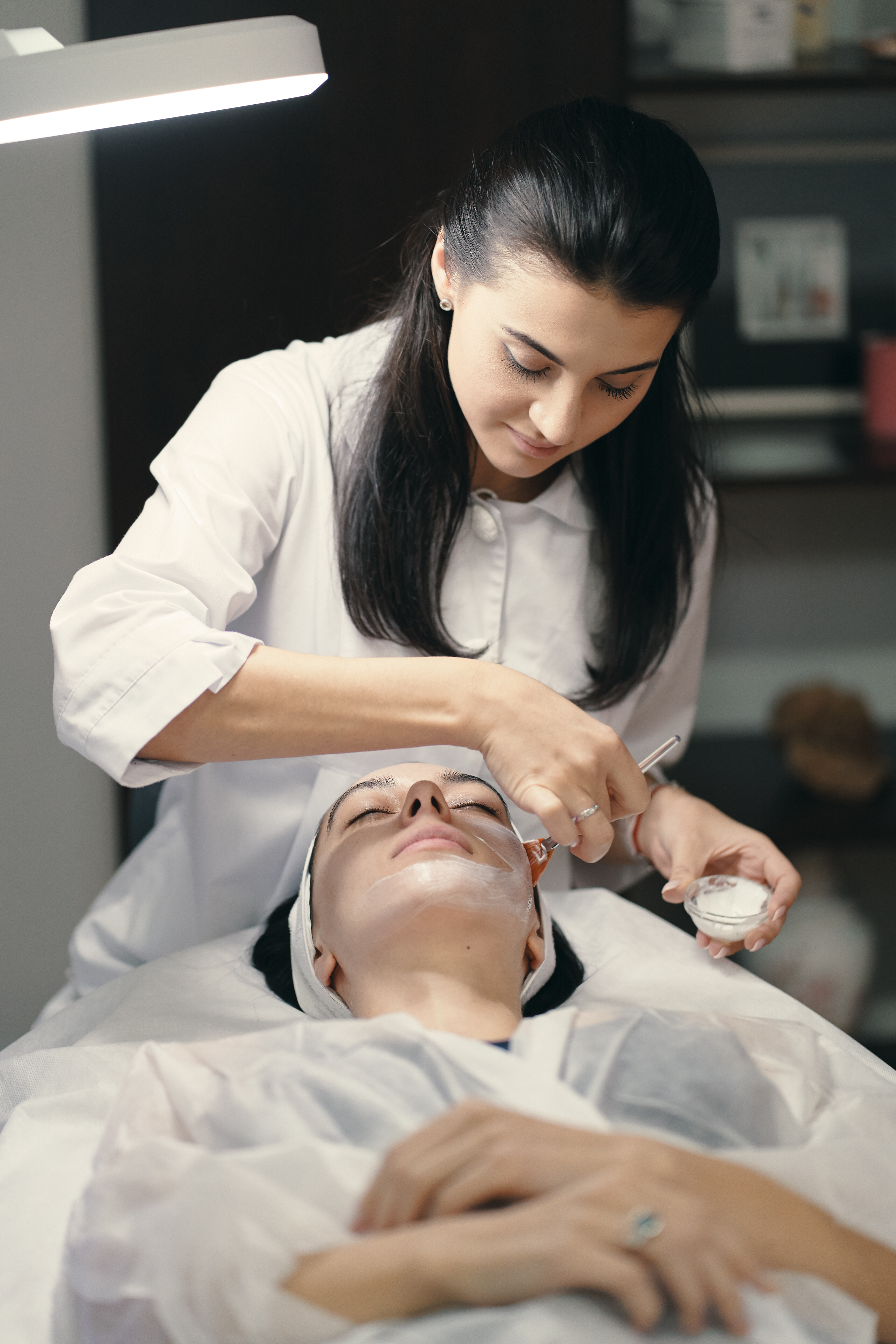 A group of students in a beauty training class